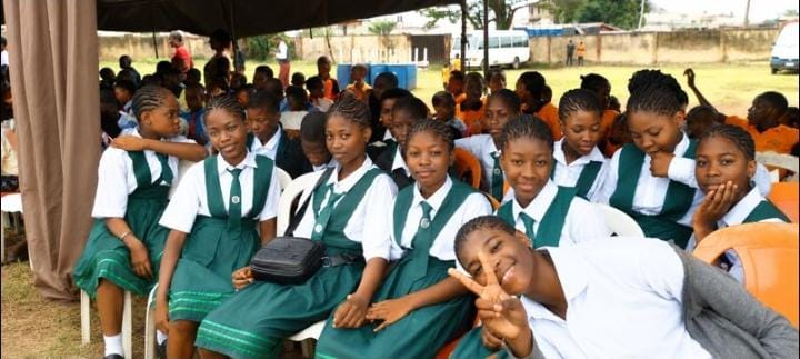 Students seated together at a school gathering